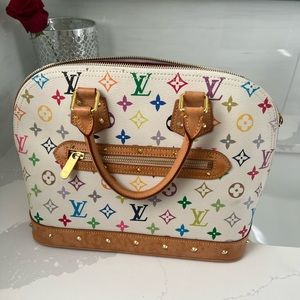 Louis Vuitton monogram handbag. Comes as is